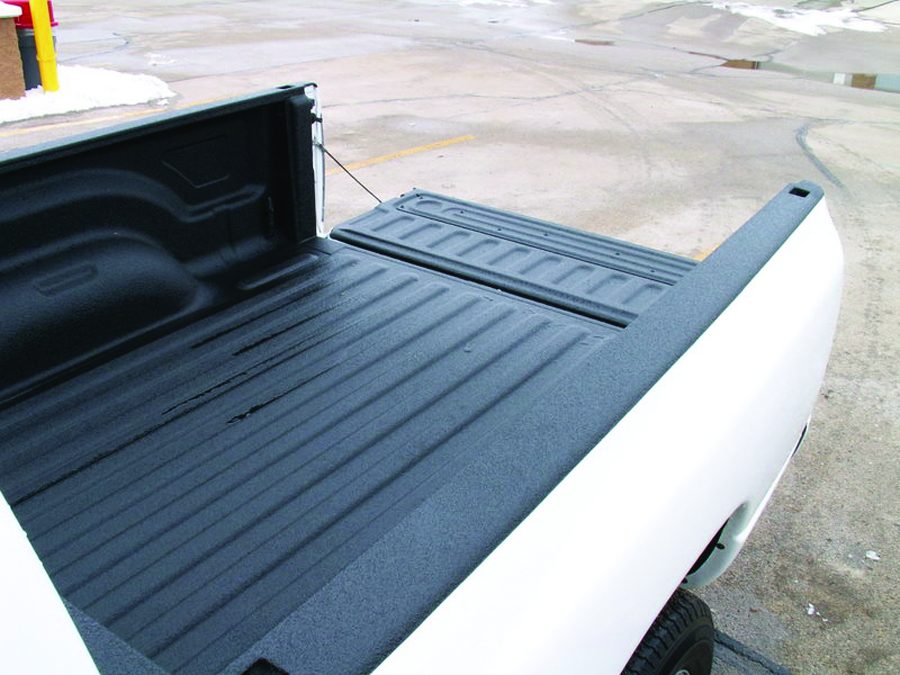Truck bed metal protected by an OxiHalt membrane